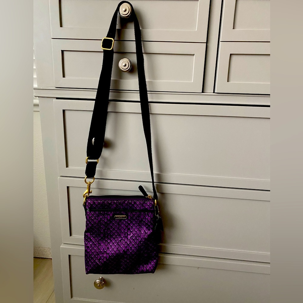 Coach crossbody. Purple cloth.